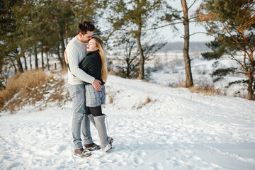 happy young couple in the park