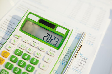 tax time. calculator and documents on table