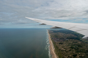 Fototapeta na wymiar View through an airplane window.