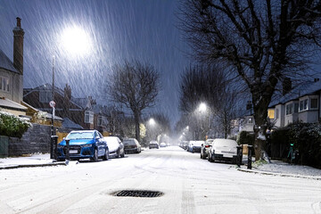 Snowy night in West London suburb at Christmas time