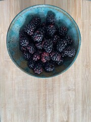 Organic Blackberries in ceramic bowl