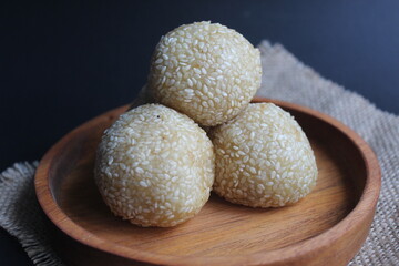 Onde-onde cake is made from glutinous rice flour filled with green beans and sprinkled with sesame seeds