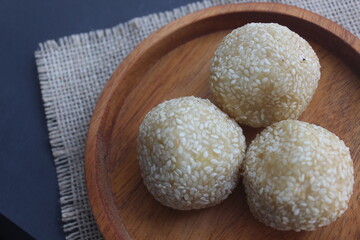 Onde-onde cake is made from glutinous rice flour filled with green beans and sprinkled with sesame seeds