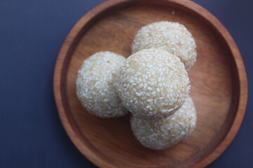 Onde-onde cake is made from glutinous rice flour filled with green beans and sprinkled with sesame seeds