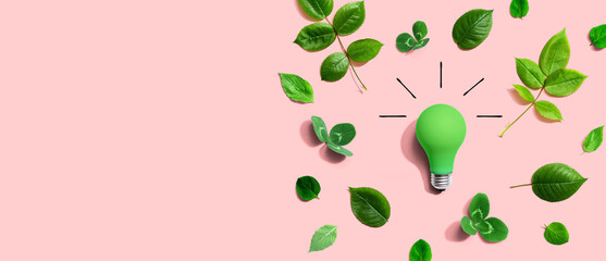 Green light bulb with green leaves - Flat lay - Powered by Adobe
