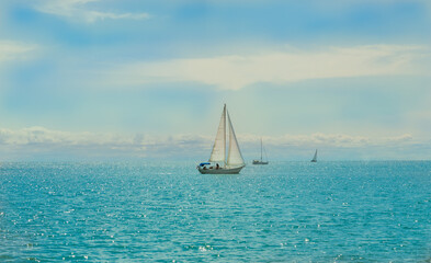 sailing on the sea, gorgeous summer vacation day with people relaxing and enjoying their time