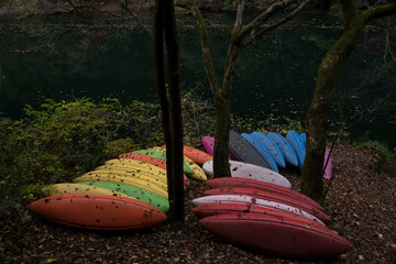 boatyard natural place. Colorful autumn landscape.Nature background. Boat near the lake in the autumnal forest. Autumn Peaceful Landscape. Japan