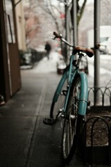 Fototapeta na wymiar Retro vintage blue bike with leather sear in new york city manhattan