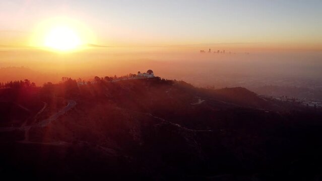 Sunrise of the Obersvatory in Grifftih park at los Angeles California. all the runyon canyons and trails can be seen.