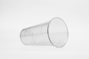 transparent plastic cup with a white background