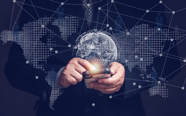 Businessman using mobile phone as a tool for analyzing data and ordering work via wireless network communication without borders Network connection