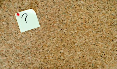 Single note question mark pinned cork board