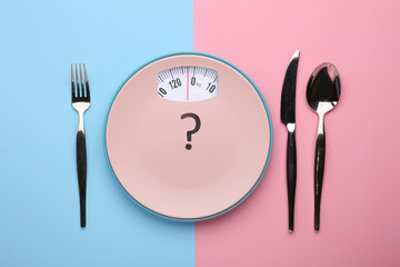 Plate and cutlery on color background. Diet concept