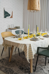 Festive table setting in light room