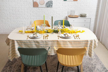 Festive table setting in light room