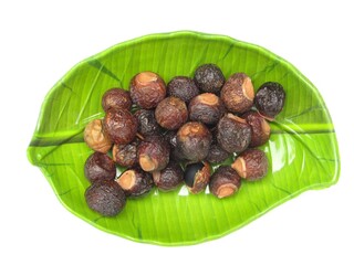 Sapindus mukorossi or Indian soapberry in a plate 