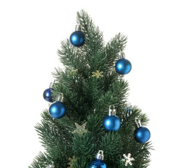 Small Christmas tree with decorations on white background, closeup