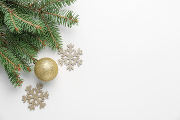 Fototapeta na wymiar Christmas branches with ball and snowflakes on white background, closeup