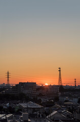朝日　夜明け 都市風景 日の出　朝焼け 住宅
