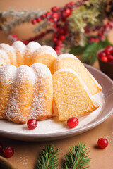 Plate with sweet Christmas cake on color background, closeup