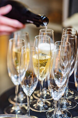 champagne glasses on catering table
