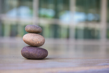 small smooth waterworn black pebbles or stones for use decor and garden landscaping. tone garden interiors. stone spa