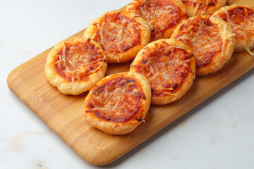 Banquet table with variety of stuffed pies pastry