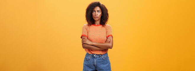 Why life so unfair. Portrait of cute offended and gloomy displeased african american young woman...