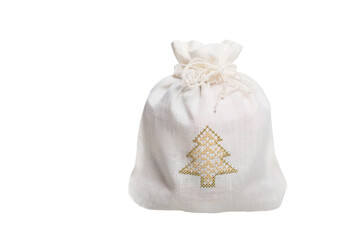 Isolated linen gift sack decorated with embroidered Christmas tree on white background, holiday concept, copy space, transparent PNG