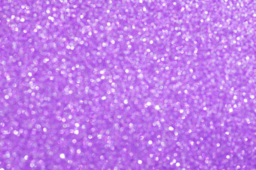 Purple abstract shiny background with bokeh and sparkles. Selective focus, bokeh. Christmas background