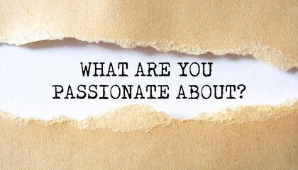 What Are You Passionate About? word written under torn paper.