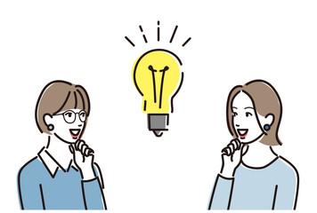 若い女性　電球　二人