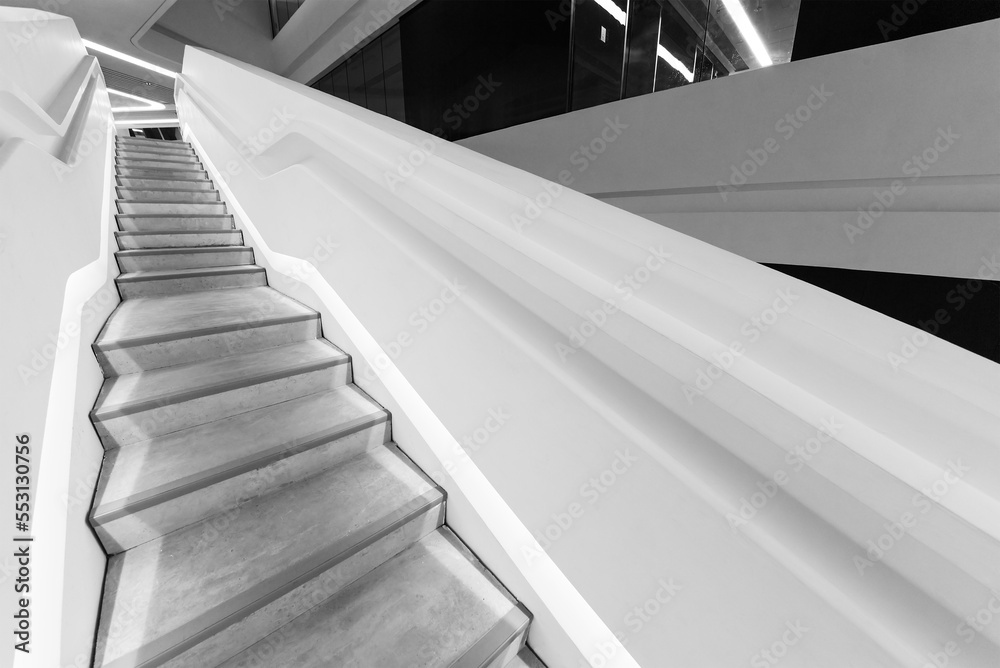 Aufkleber empty futuristic stairway in modern building. architectural abstract background