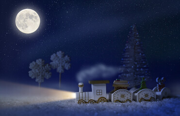 Fototapeta premium New Year's background, a holiday card with a wooden train in the snow. christmas tree. Starry night.