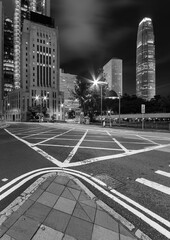 Empty street in downtown district of Hong Kong city at night
