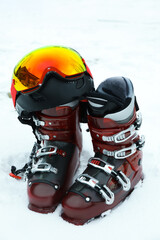 Ski boots with ski helmet with goggles outdoor