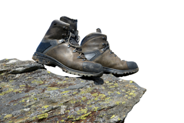 Hiking shoes on the rock isolated, PNG.