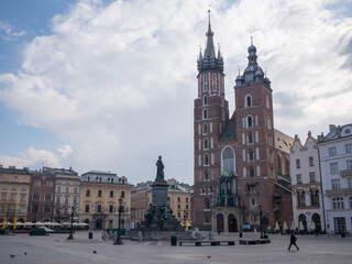 Fototapeta na wymiar square of Rynek Główny with a few people in krakow old city