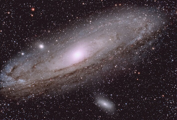 Andromeda galaxy amidst shiny stars in space