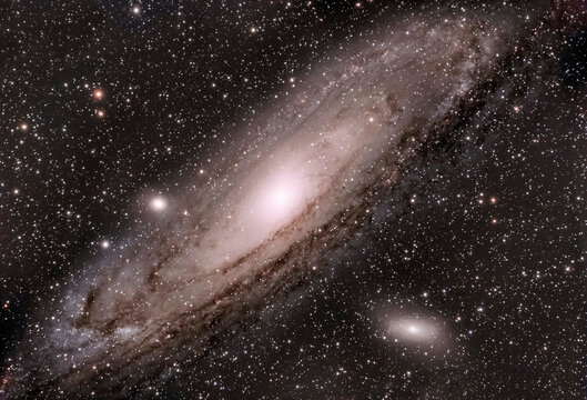 Andromeda galaxy surrounded by stars in sky