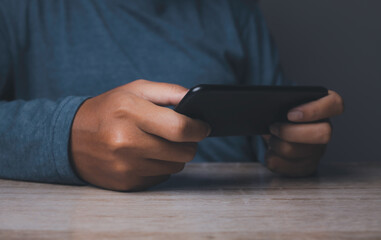 Man playing video game on internet with an imaginary video player service.