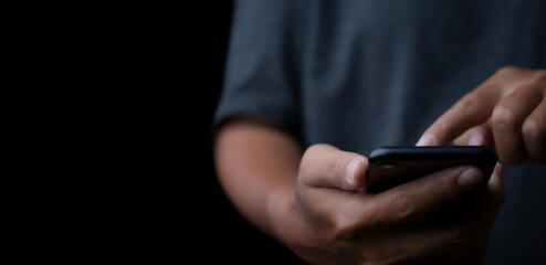 Young man using smartphone.