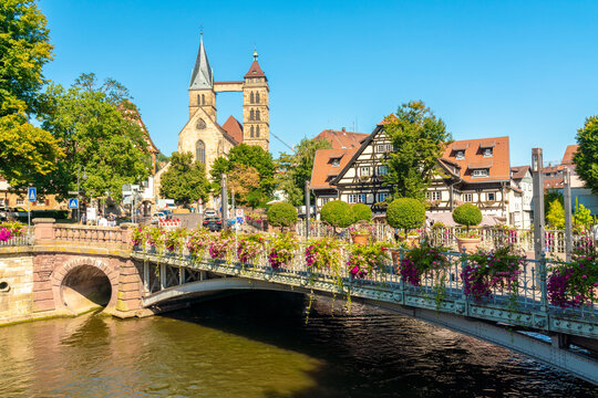 Germany, Baden-Wurttemberg, Esslingen, St.-Agnes-Brucke with towers of Stadtkirche St. Dionys in background