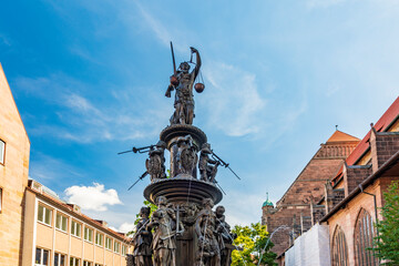 Germany, Bavaria, Nuremberg,Statues of 16th century Tugendbrunnen fountain