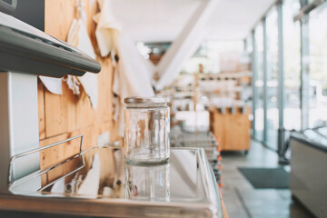 Empty jar on weight scale in convenience store