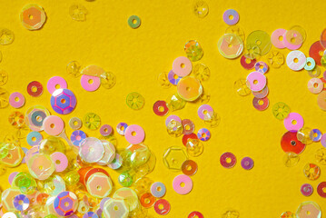 sequins on the yellow background