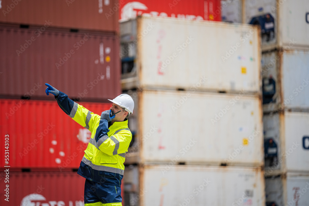 Aufkleber Engineer or foreman checking inventory or job details with cargo container background,Logistic import export working concept.