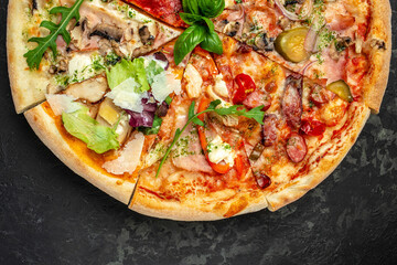 slices of pizza with different toppings on a dark background, banner, menu, recipe place for text, top view