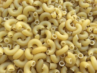  top view of raw macaroni pasta . 
