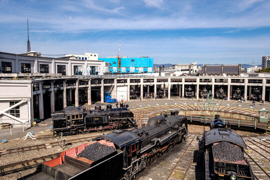 Roundhouse with turntable in Kyoto Railway Museum. It was formerly the Umekoji Locomotive depot and is oldest existing reinforced-concrete car shed extant in KYOTO, JAPAN on JAN 26, 2020